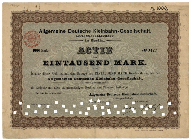 Alter deutscher Staatsanleihe-Schein mit gedrucktem Text und einem offiziellen Stempel.