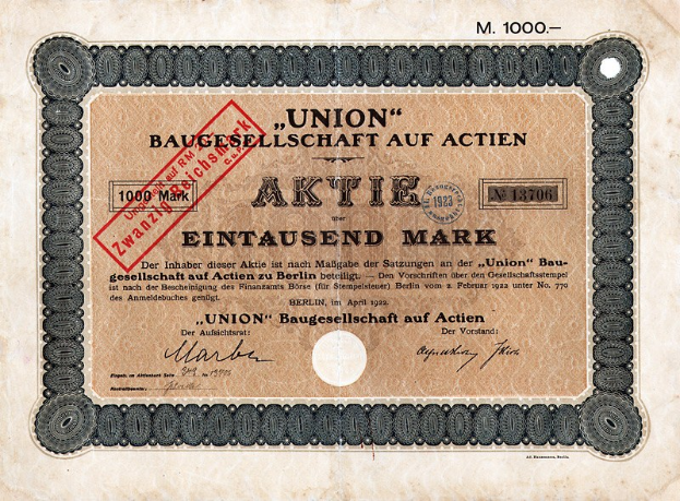 Alte deutsche Banknote mit rotem Stempel, als Aktie gekennzeichnet.